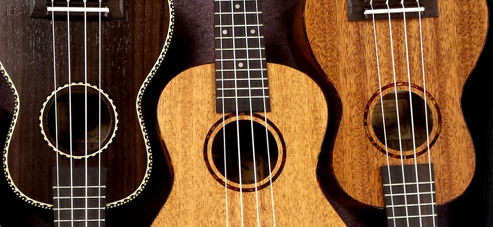 ukuleles stacked