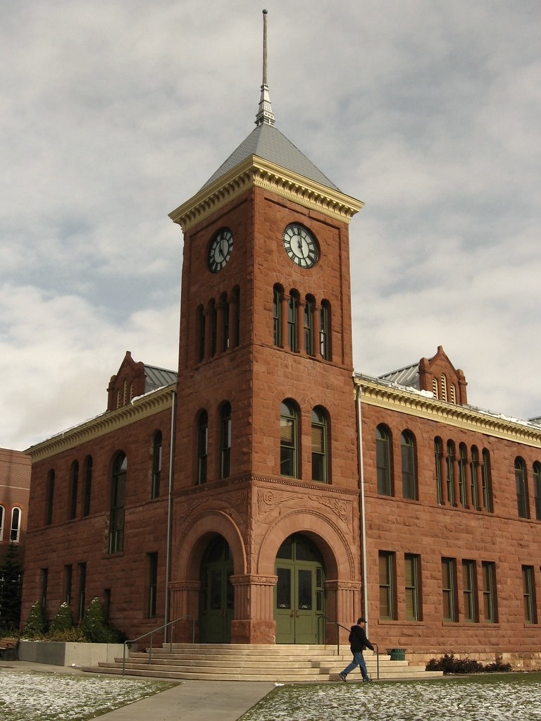 Brown-redish colored clock tower