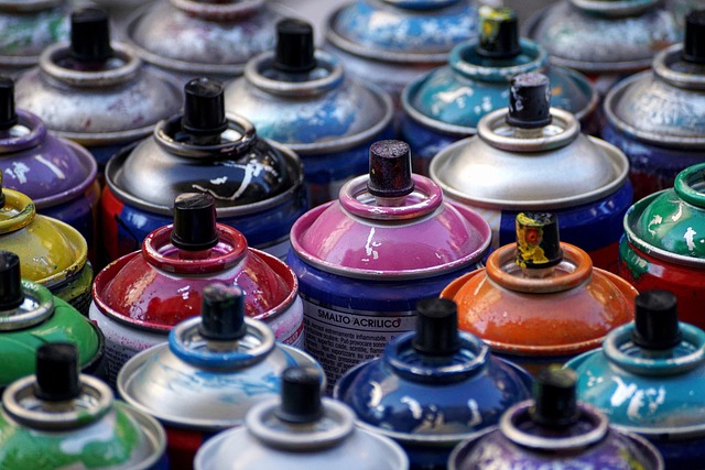 Many colorful paint cans