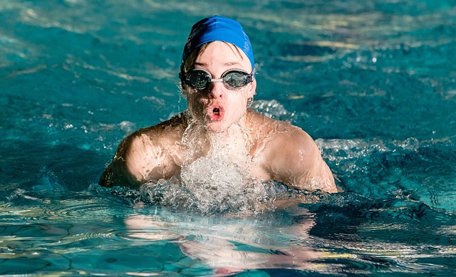 Kid swimming in a pool