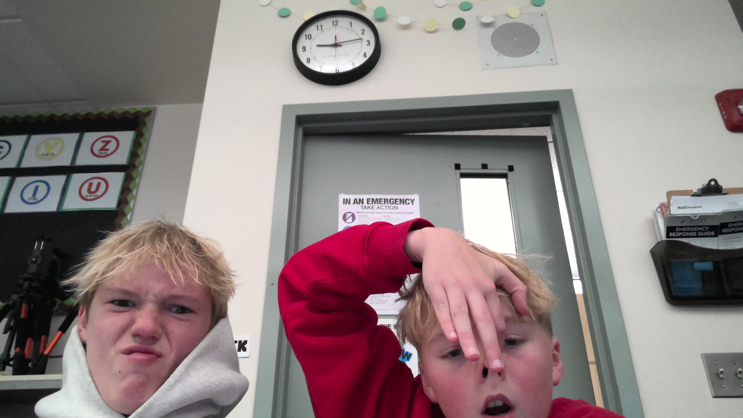 Logan and Hayden making a face.