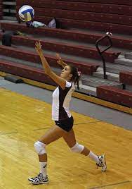 a women serving a ball