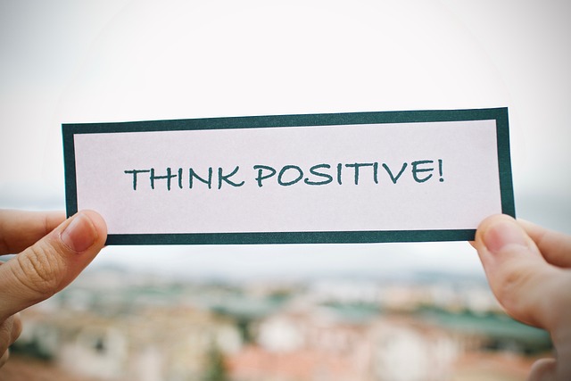 a sign that says, Think Positive!