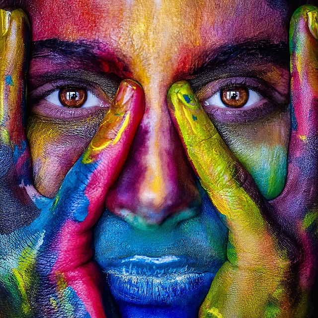 painting of a girl using lots of color