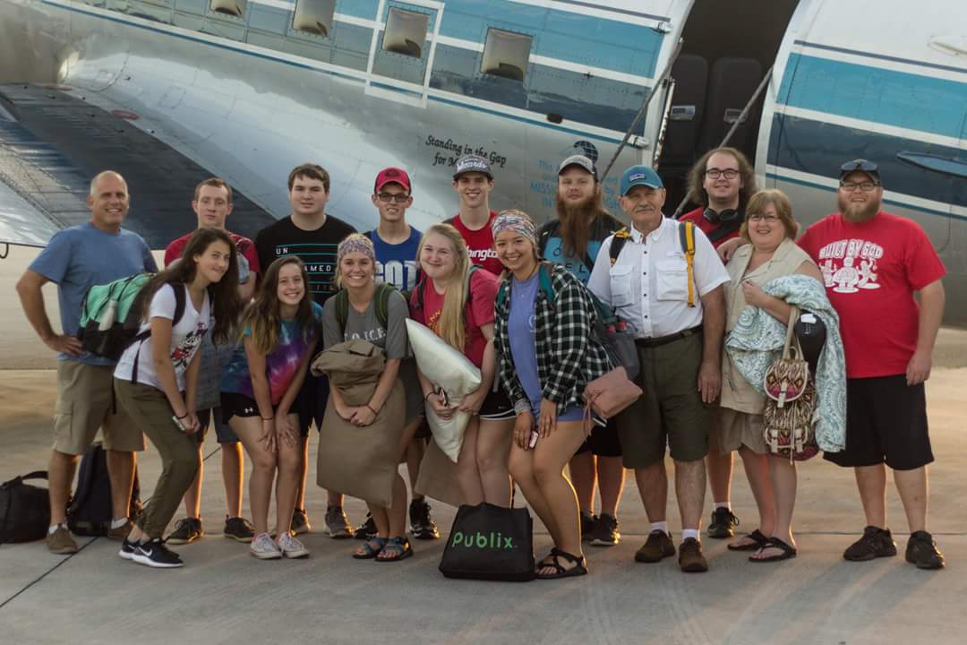 by the plane