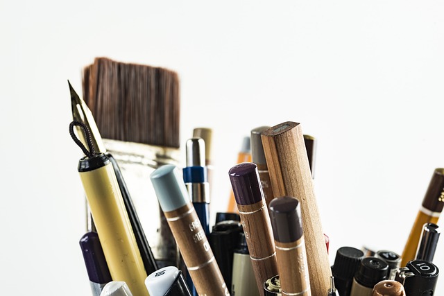  stack of pens and piantbrushes 
