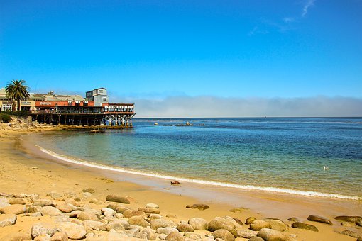 View of the Monterey Bay coast on a sunny day with blue waters