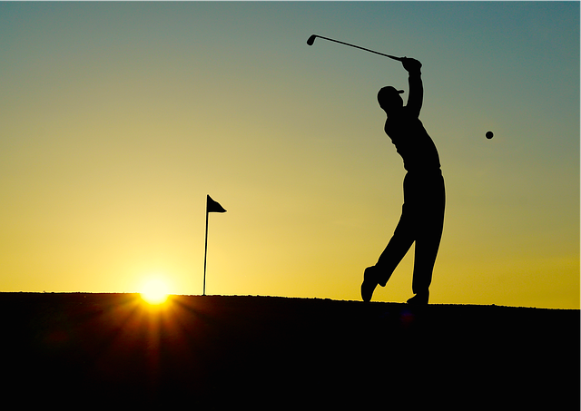 Golfer In Sunset