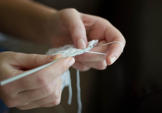 crocheting person