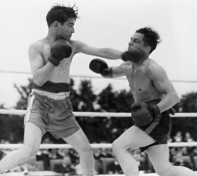 Two people boxing