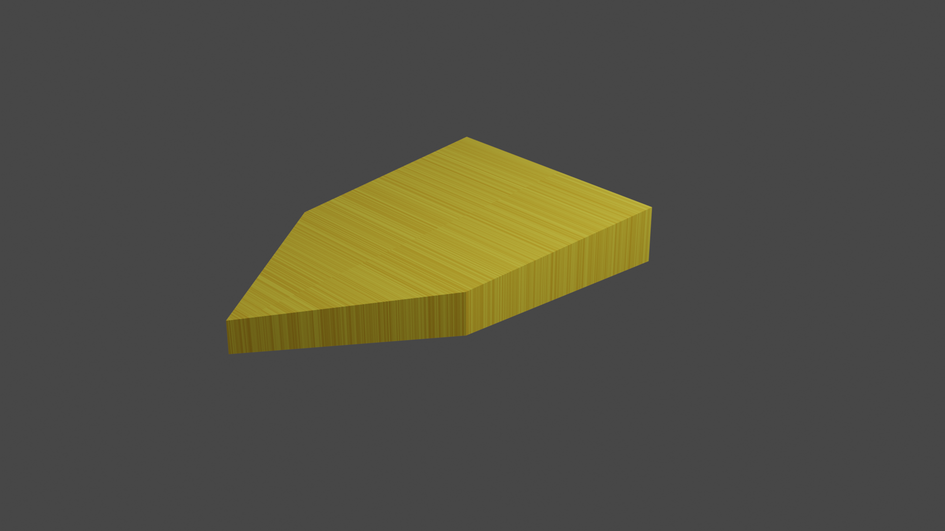A Shogi piece, a 3d pentagon that that has two sides that are pointing slightly inward towards the point.