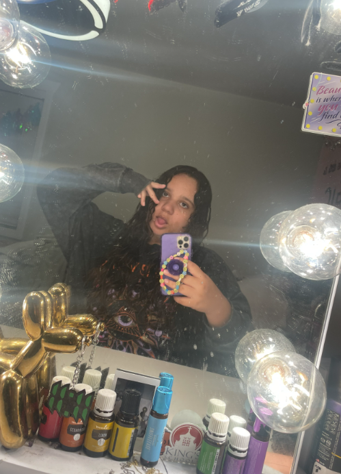 karleah infront of a mirror taking a photo