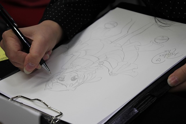 person drawing anime character