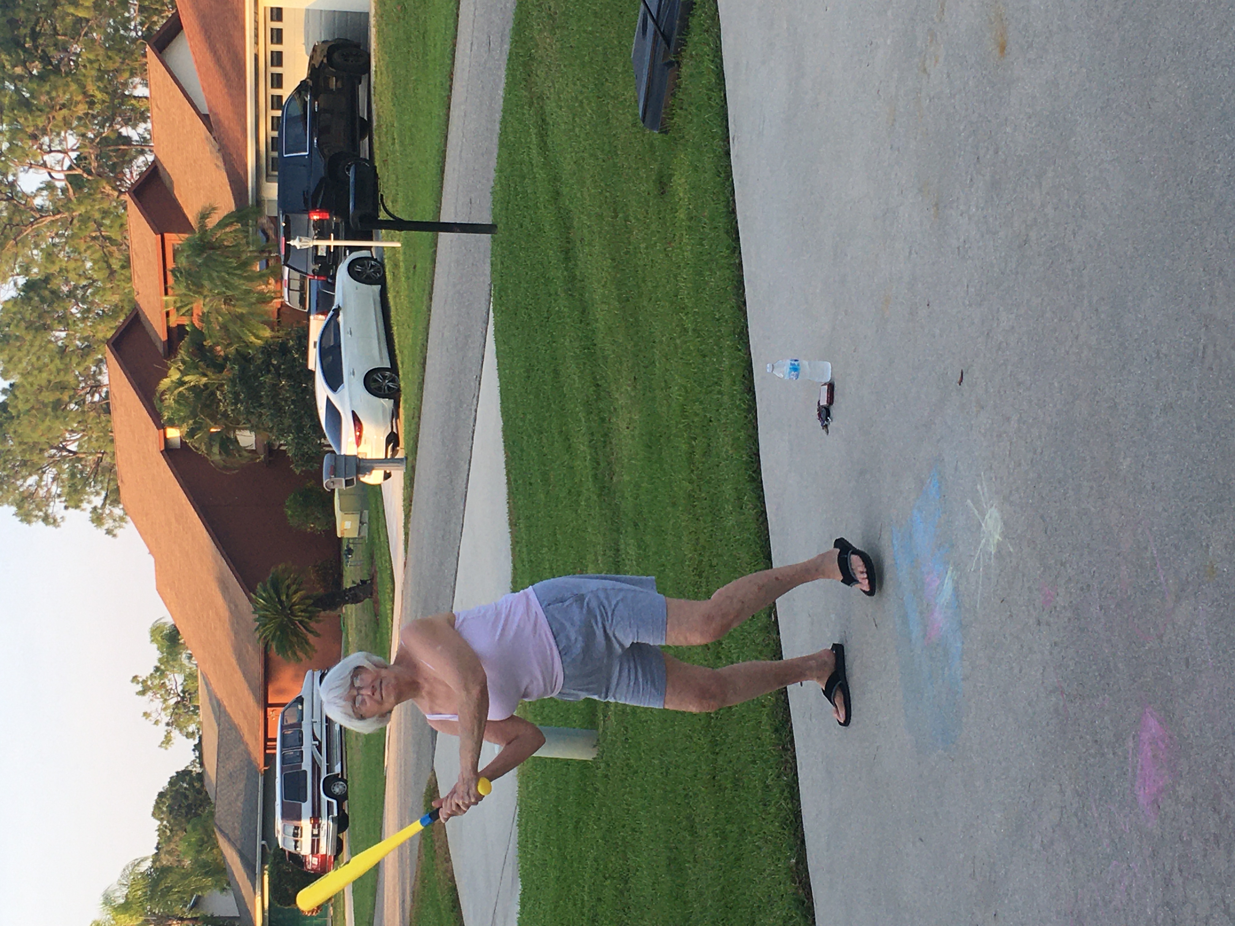 Grandma playing baseball