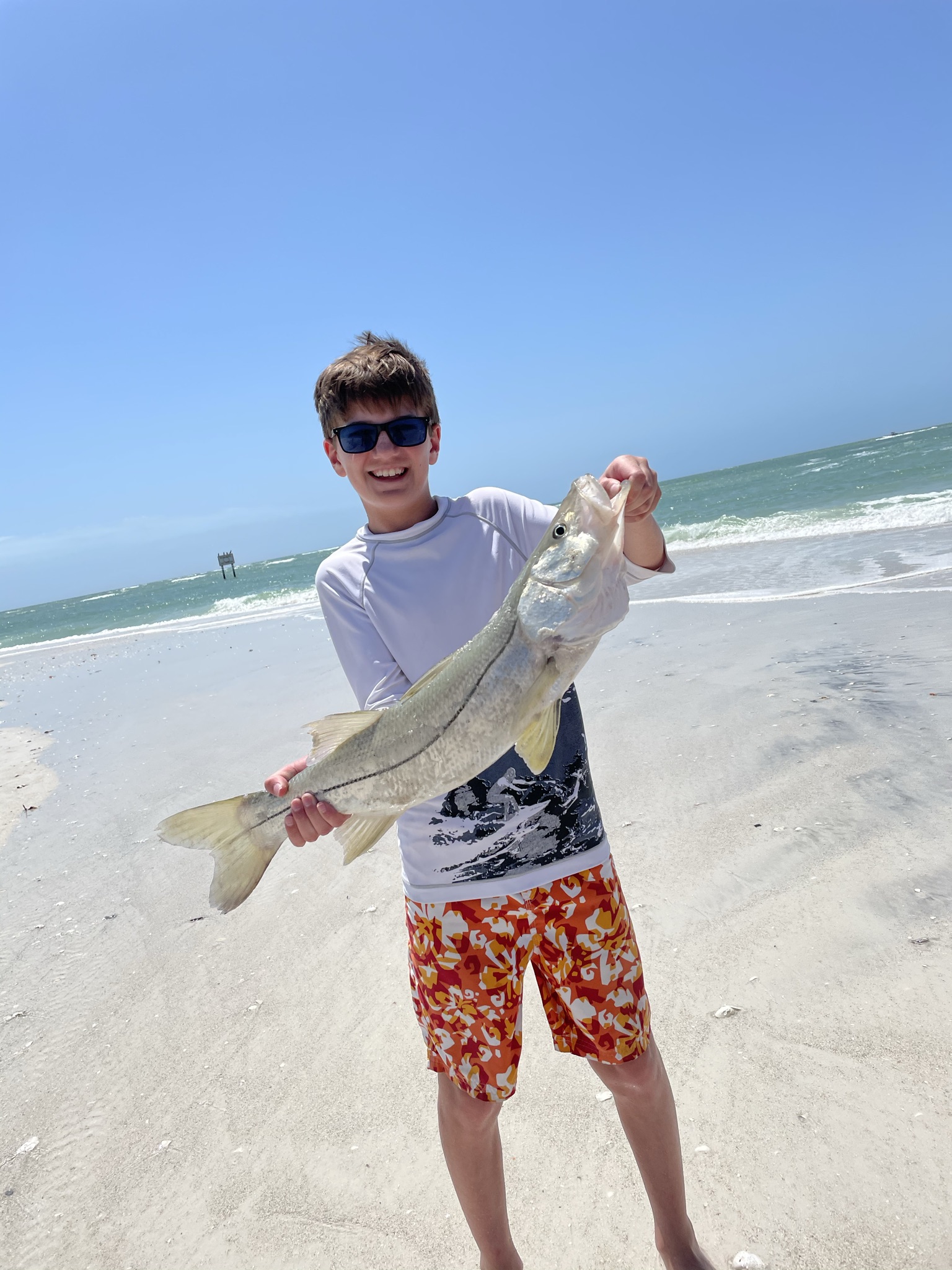 Me holding a fish I caught in the Gulf of Mexico