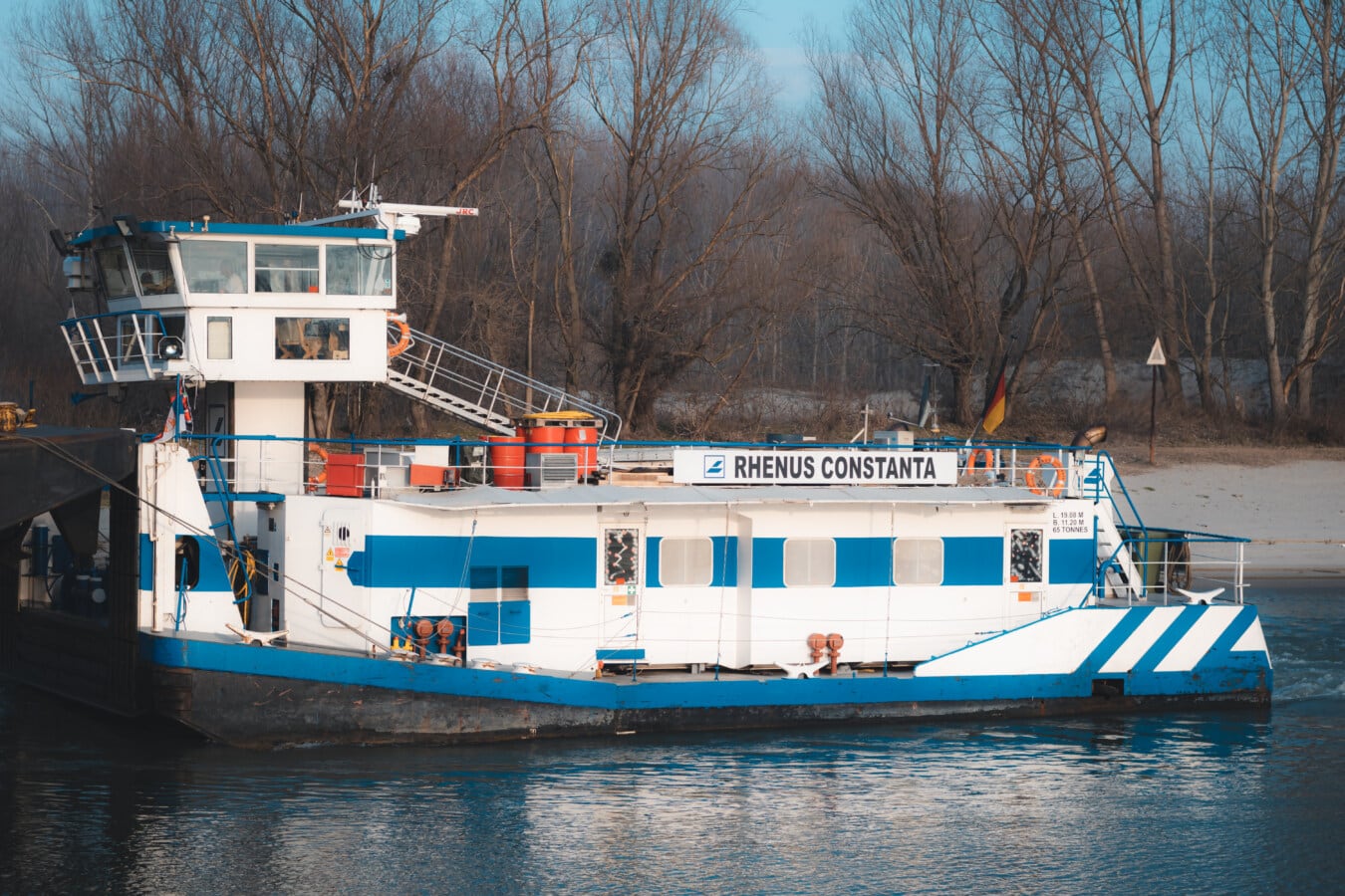 A white and blue ferry.