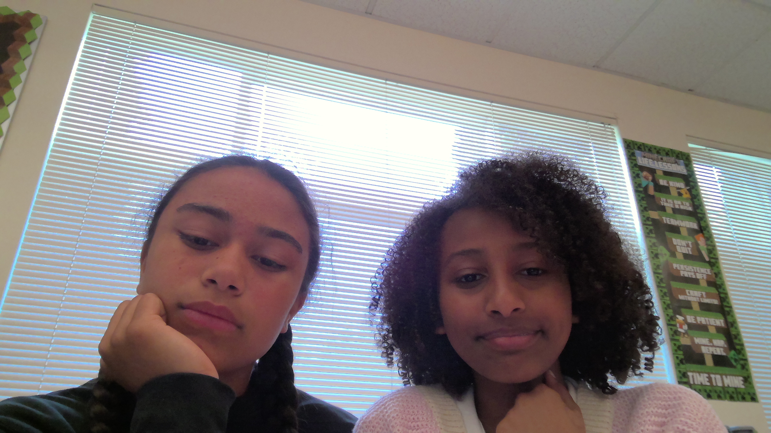 Two girls smiling.