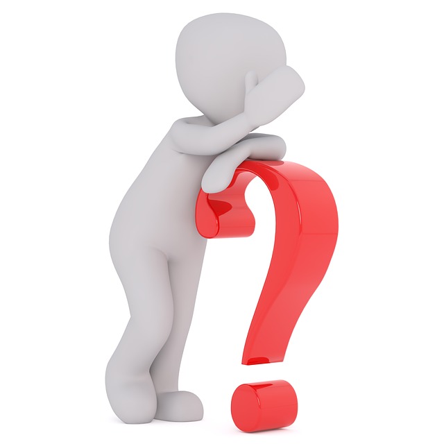 white character resting on a red question mark