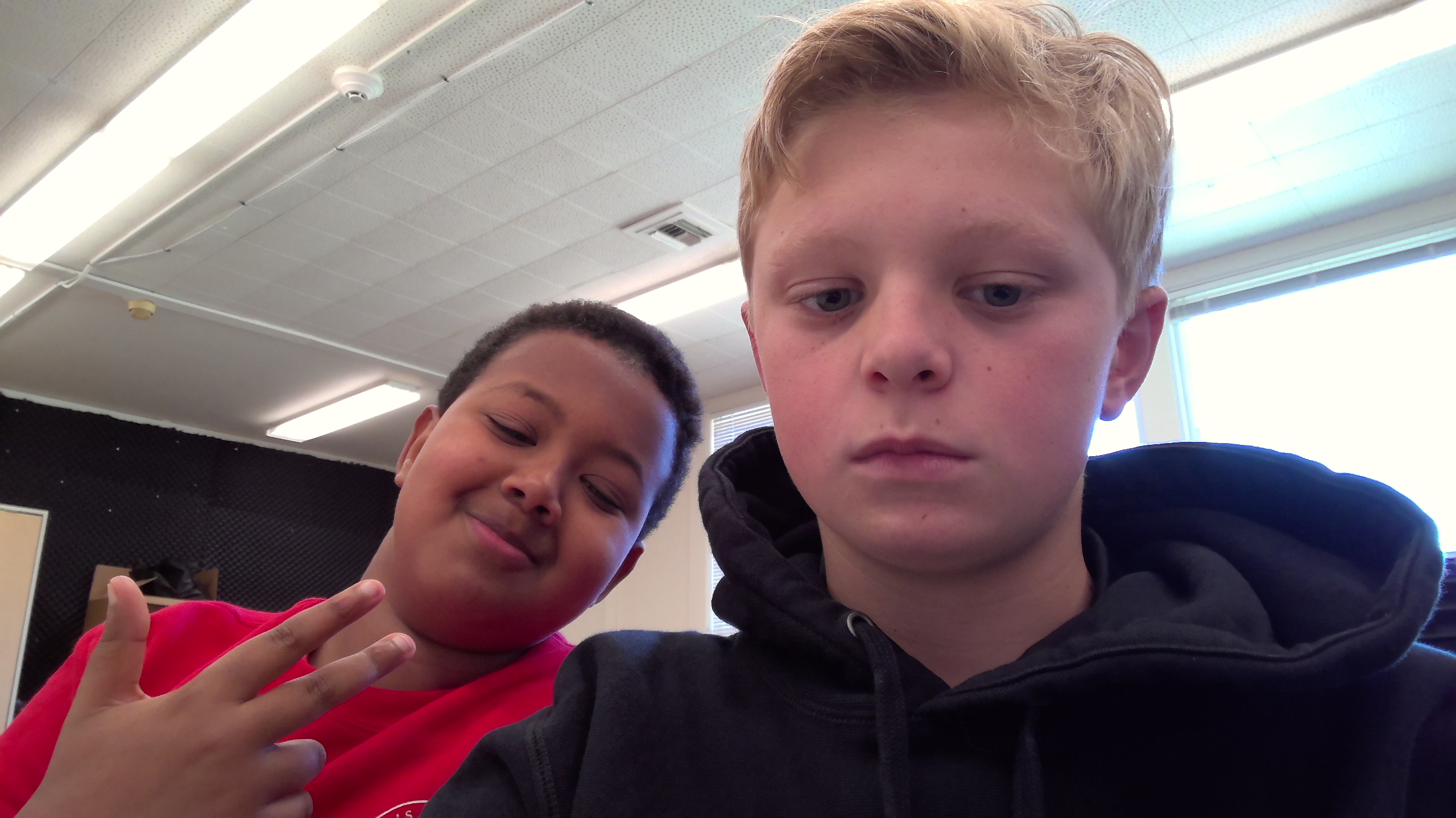  Two boys taking a picture