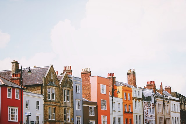 houses so close together they have to room to breath, with different colors