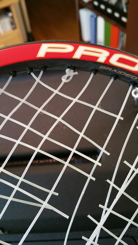 Broken Tennis Racket Strings