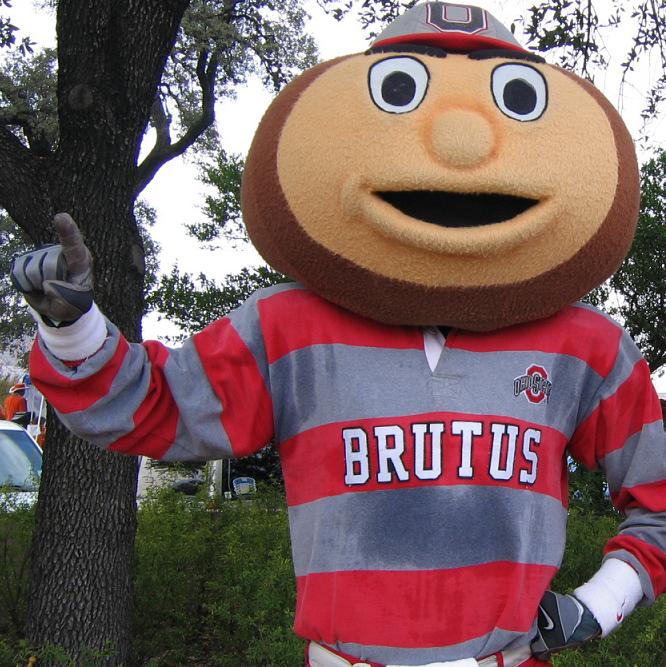brutus beside a tree