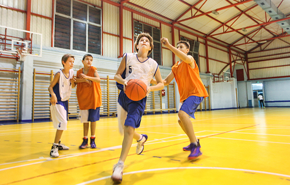 boy playing basketball