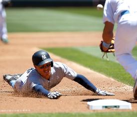 sliding in to home plate