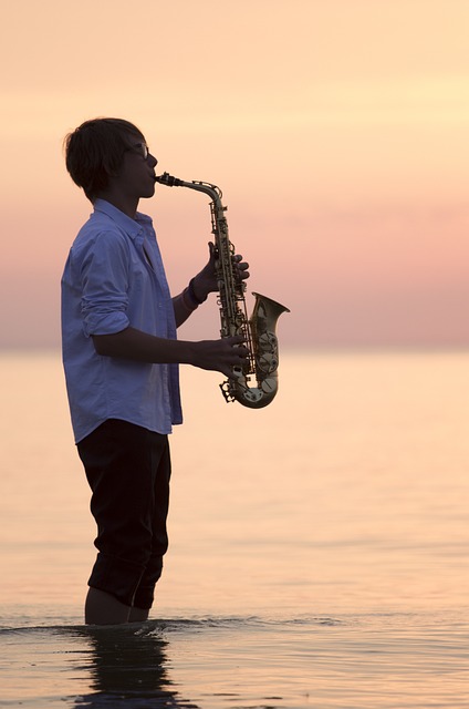 Man playing saxophone in water