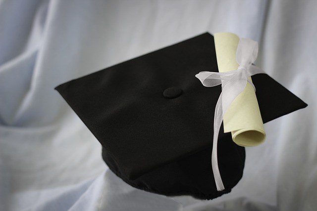 diploma on graduation hat-vloveland