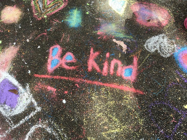Be Kind spelled out in chalk-somone