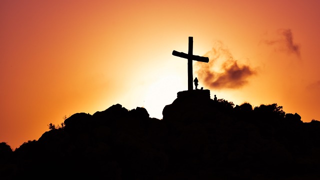The cross of Jesus Christ on top of a hill