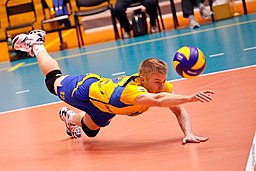 Libero digging the ball